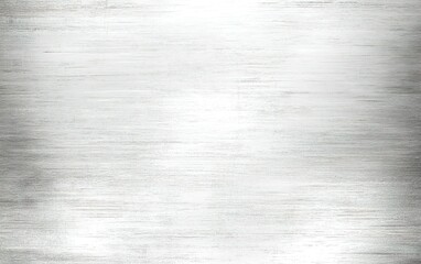 Fototapeta premium A textured metallic surface with a brushed finish reflecting soft light in a dimly lit environment