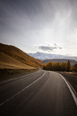 country road in autumn mountain landscape