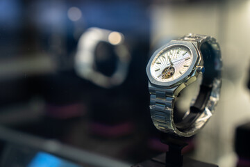 A wristwatch in a display case