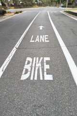 A vertical shot of a bike lane between through traffic and right turn lane