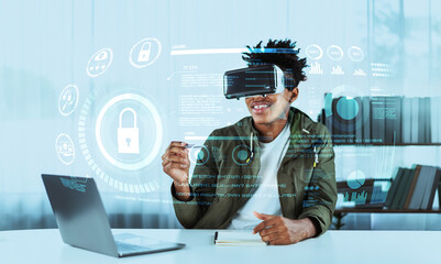Skilled african man looking at personal data while wearing VR glasses. Person with casual shirt checking and analyzing security protection and accessing firewall protection. Technology. Ingenuity.