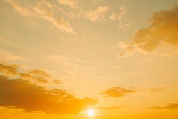Fototapeta premium Golden Sunset with Clouds Painting the Sky in Serene Beauty