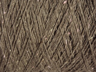 The textured surface is gray as a background. Felt