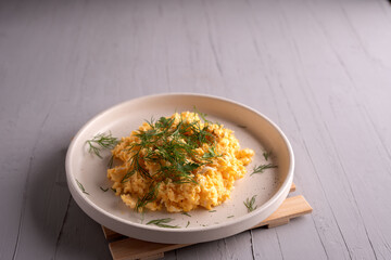 photo, egg, cooking, plate, image, scrambled, eggs, recipe, food, kitchen, breakfast, topped, fresh, background, herbs, dill, black, pepper, whole, table, meal