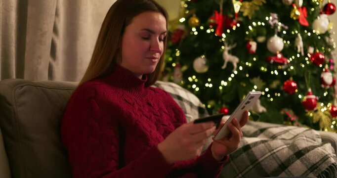 Woman Shopping Online During Christmas Season