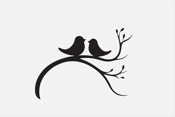 A black silhouette of two small birds sitting on a thin.