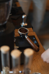 portafilter on a coffee scale for a barista course