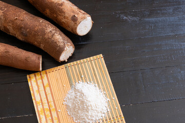 Three cassava roots on a table