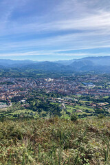 Fototapeta premium Panoramic view on Oviedo city and surrounding mountains in Oviedo, Spain