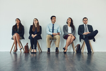 Business people, queue and bored for interview, recruitment and human resources with bags and...