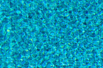 A Vibrant Turquoise Pool With Sparkling Water Reflections Inviting Summer Relaxation and Enjoyment...