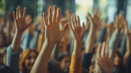 Group of diverse people raising hands in a seminar