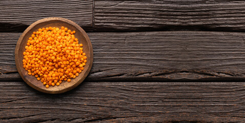 Lens culinaris - Organic red lentils in the bowl.