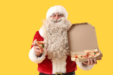 Santa Claus tasty pizza on yellow background