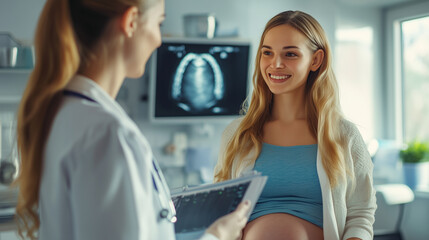Gynecologist shares ultrasound scan with happy pregnant patient during medical appointment in office