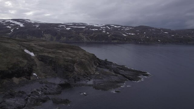 Beautiful rock formations on the coast at North Cape in Norway, D-Log for better color grading