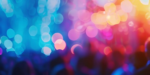Defocused shot of a business convention, with a crowd and abstract background lighting