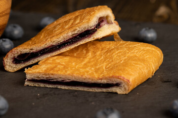 ripe blueberry buns with blueberry jam