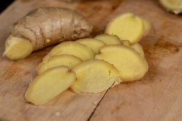 details of the ginger root used in cooking sliced into pieces