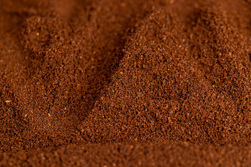 a large amount of ground coffee powder close-up