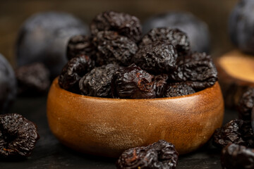 ripe purple plums and dried plums