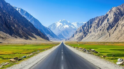 Scenic Road Through Majestic Mountain Landscape