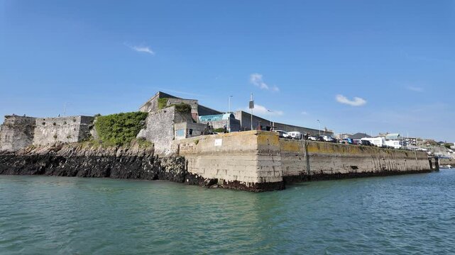 Plymouth Devon England, 30.09.2024. Video,  Sailing out of Plymouth Barbican area and viewing the Royal Citadel  buildings and security wall.