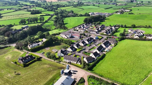 Aerial view of Residential homes, town houses, bungalows, housing, in Corkey village Co Antrim Northern Ireland