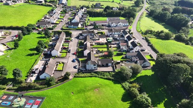 Aerial view of Residential homes, town houses, bungalows, housing, in Corkey village Co Antrim Northern Ireland