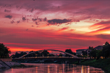 Background of morning light in the religious tourism area in Phitsanulok, Thailand. Wat Phra Si Rattana Mahathat Woramahawihan has an old church and beautiful Buddha statues.