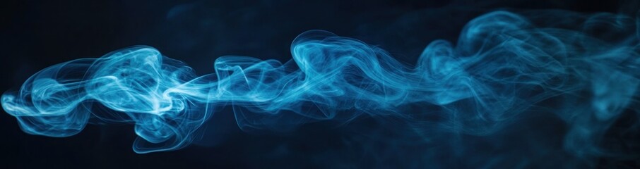 Fototapeta premium Abstract blue smoke wisps on a dark background, perfect for design.