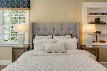 Elegant Bedroom With Tufted Headboard And Soft Lights