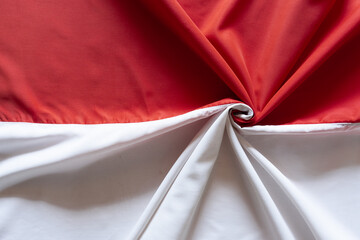 Top View of Wavy Red and White Indonesian Flag.