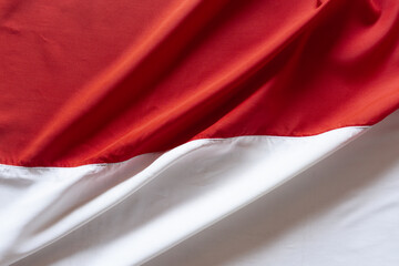 Top View of Wavy Red and White Indonesian Flag.