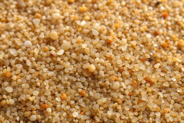 Beach sand close-up showing individual grains and sand texture