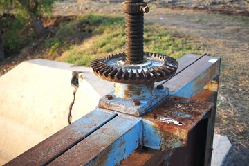 photo of a dam gate for irrigating rice fields, made of iron