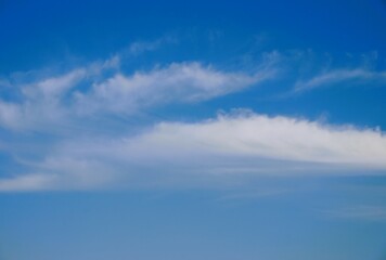 Obraz premium photo of a clear blue sky and white clouds, looks beautiful