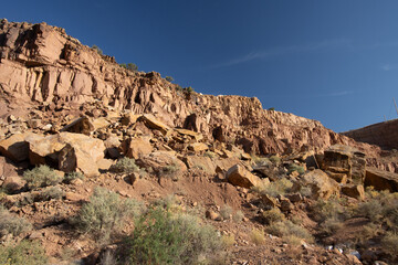 Steep, rocky walls of the scenic Río Chama canyon, or Chama River Canyon below Abiquiu Dam in northern New Mexico, USA