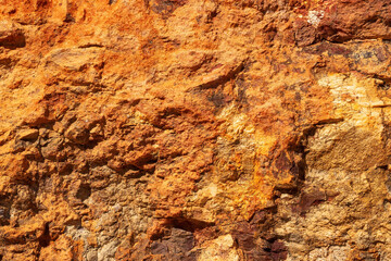 Striking hues and intricate patterns unfold in this sedimentary rock snapshot, revealing the geological tales etched in Earth's vibrant tapestry