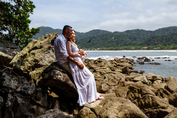 man and woman, couple, dressed in white, celebrating together, new year