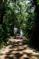 man and woman, couple, dressed in white, celebrating together, new year