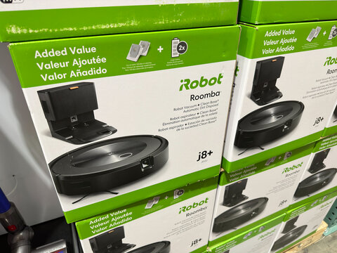 iRobot Roomba automatic robo vacuum cleaner in new packaging.