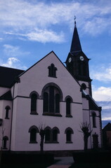 View of Protestant Parish of Plobsheim with clock tower  in Plobsheim north-eastern France during 2000s