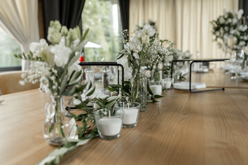 table decoration in a restaurant for a wedding banquet