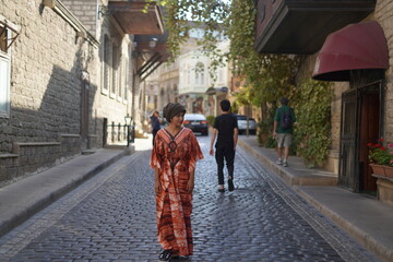 MORACON TRADITONAL DRESS GIRL IN VINTAGE CITY