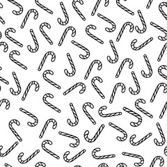 Seamless Pattern of Christmas Candy Canes in Black and White. Hand-Drawn Candy Canes Holiday Pattern in Minimalist