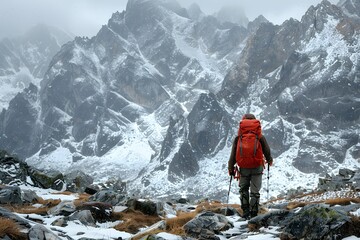 Adventurer Trekking Through Snowy Mountain Landscape