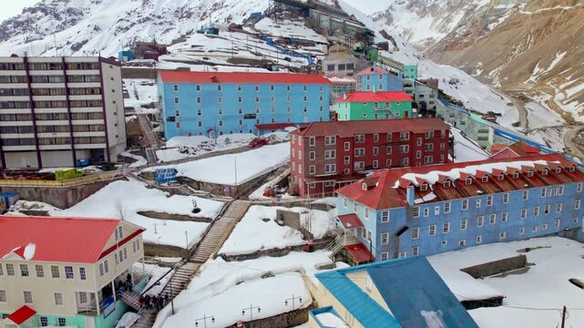 Aerial orbit establishing blocks of buildings in the town of Sewell, an industrial town in the mining camp of the El Teniente mine for the extraction of copper, Chile.