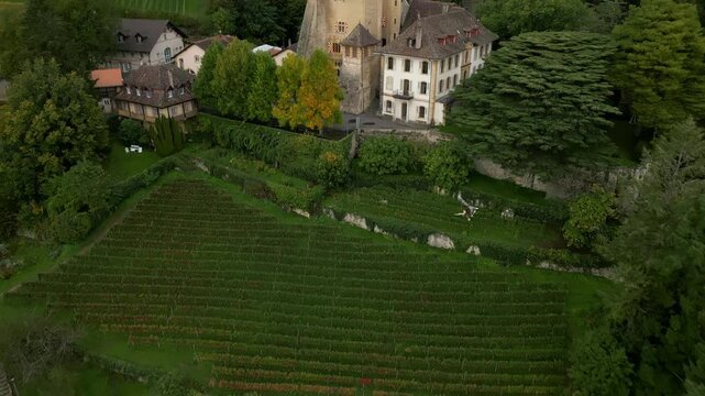 Reveal drone shot of Vaumarcus Castle in Canton of Neuchatel Switzerland