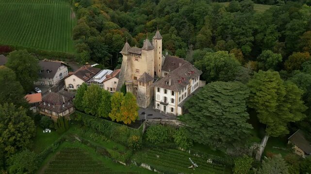 Pull out drone shot of Vaumarcus Castle in Canton of Neuchatel Switzerland